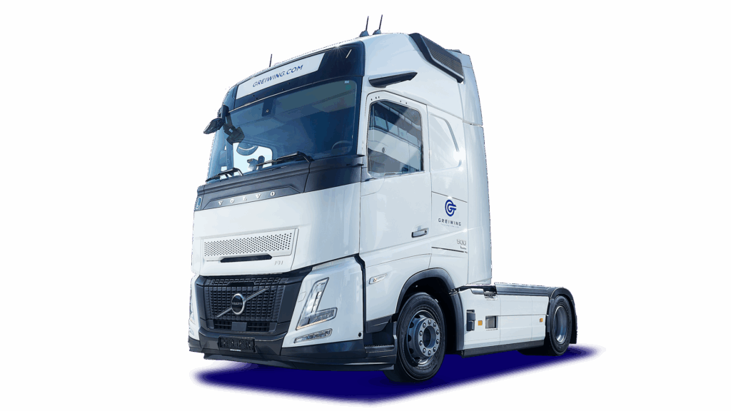 Volvo FH in weiß mit blauem Greiwing Logo.